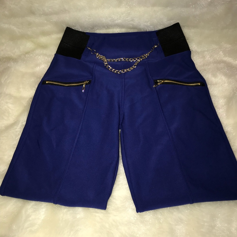 Blue & Black Leggings With Gold Chain Attached.